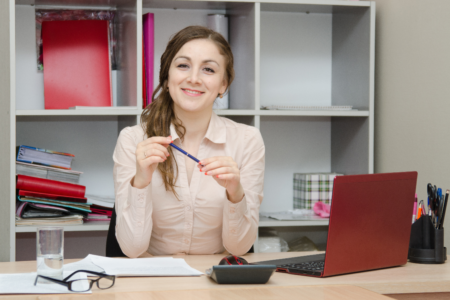 a happy woman in an office