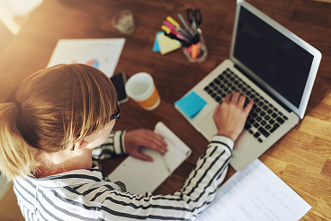 a woman using a laptop